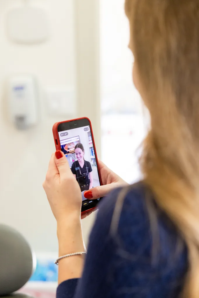 Matchstick Social Team member records social media video