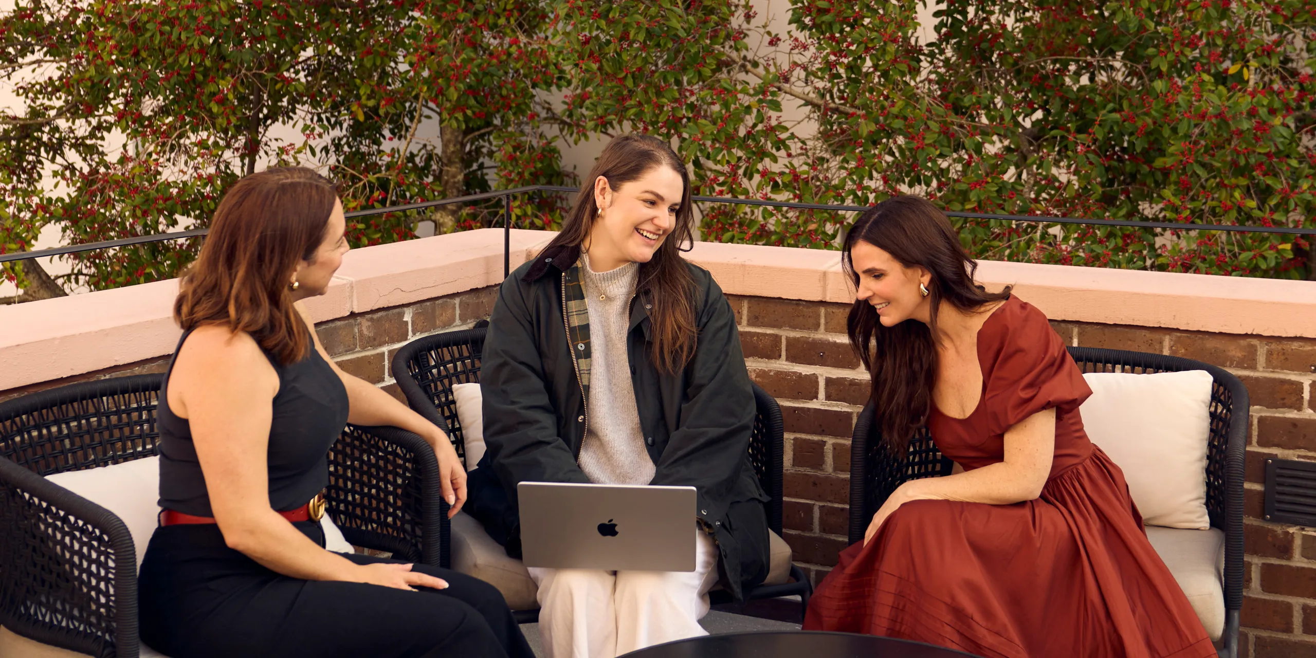 Marketing team meeting with a client during a strategy session, representing the client onboarding process at a marketing agency.