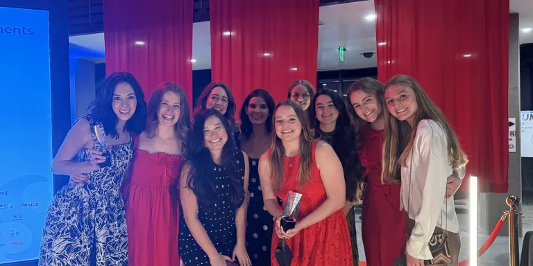 Matchstick Social team posing together and holding an award at the Charleston Spark and American Advertising Awards gala in Mount Pleasant, SC