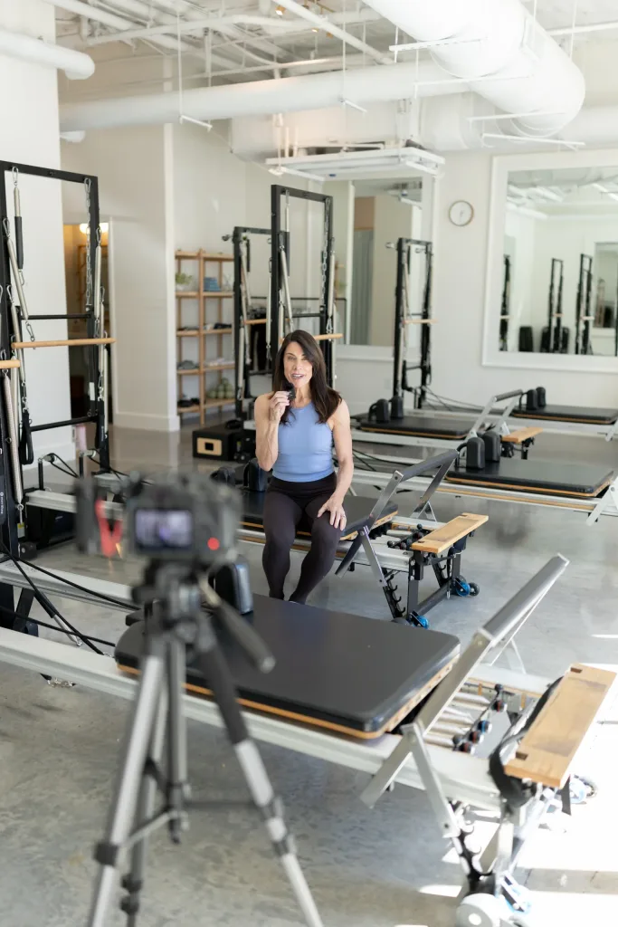 woman teaching pilates yoga