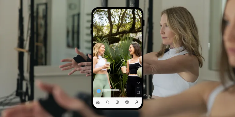 Women creating social media content on a smartphone, representing content pillars strategy for brand growth and engagement
